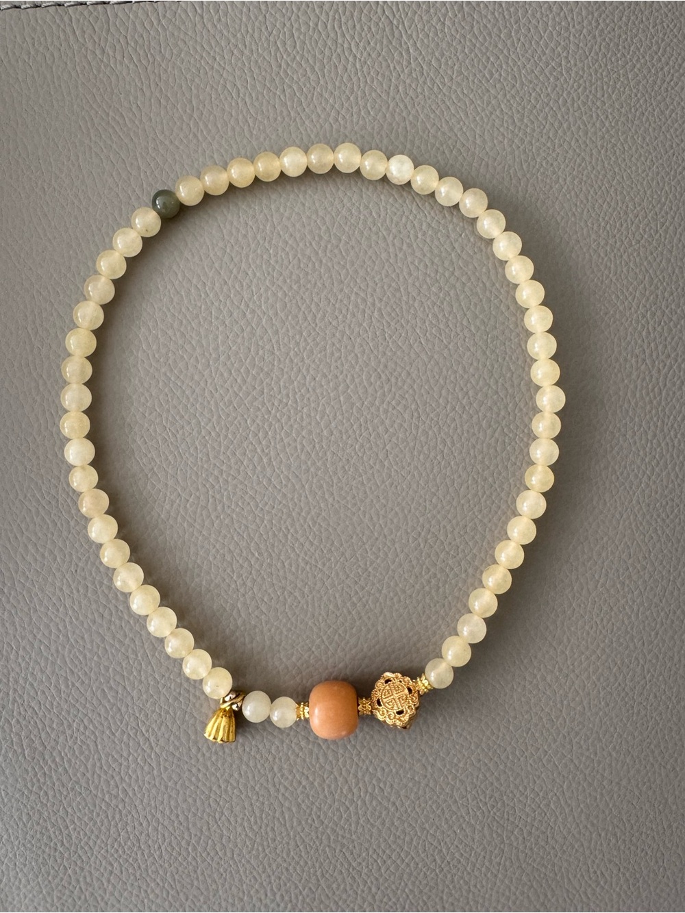 Elegant Cream Beaded Brace with Gold Accents